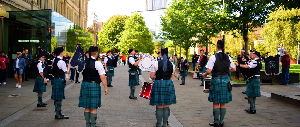 Pipers with bagpipes in aManchester bagpipe competition