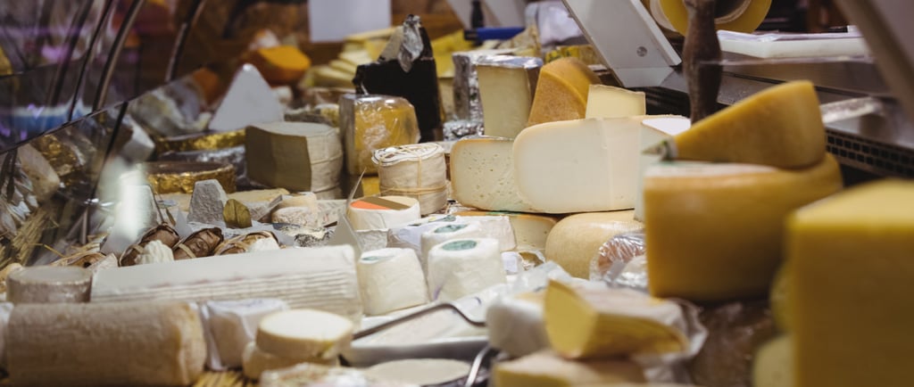 Variety of cheese at counter