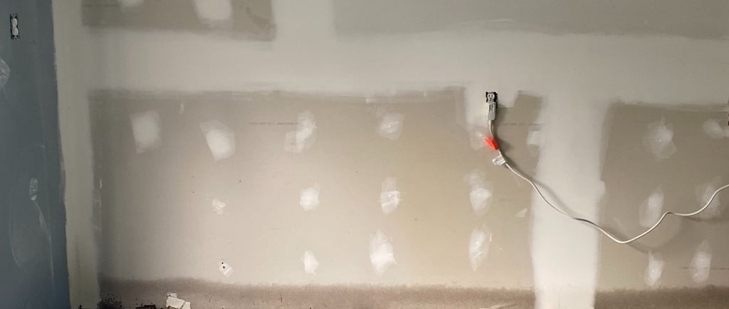 drywall taping wall before painting