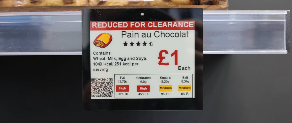 a electronic digital label sign that says pain au chocolat and a price tag on it