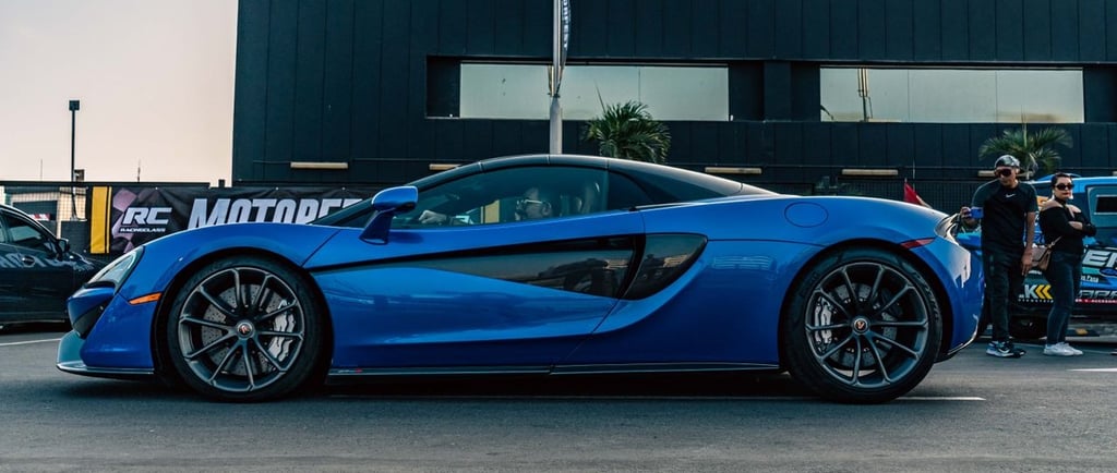 Photo by Joaquin  Delgado : https://www.pexels.com/photo/sapphire-blue-mclaren-600lt-sports-car-park
