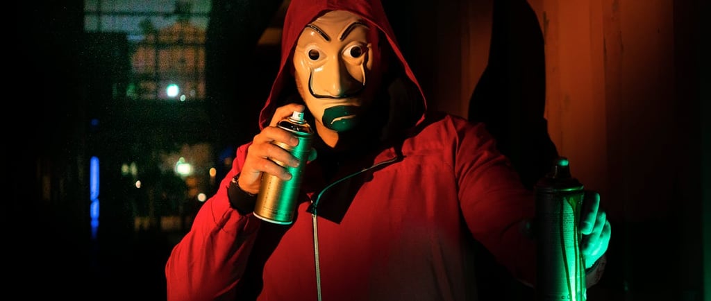 Photo by Johann Pictures: https://www.pexels.com/photo/a-person-holding-spray-paint-cans-9129725/