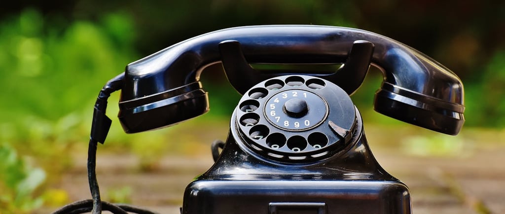 Photo by Pixabay: https://www.pexels.com/photo/selective-focus-photography-of-black-rotary-phone-163