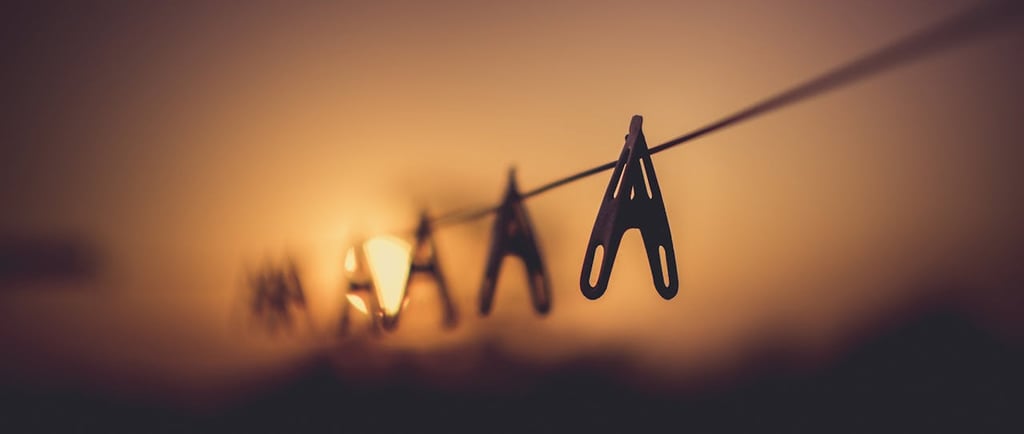 Photo by Santosh Maharjan: https://www.pexels.com/photo/shallow-focus-photography-of-wooden-clothes-