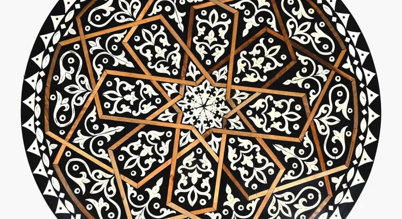 Custom handcrafted table combining bone inlay, walnut, arar wood, and resin – durable and elegant