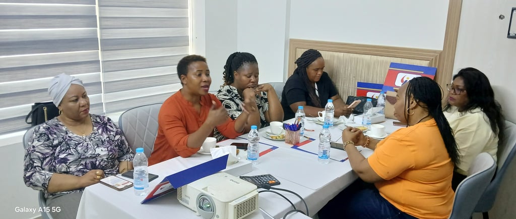 a group of people sitting around a table