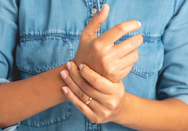 a woman with a ring on her finger