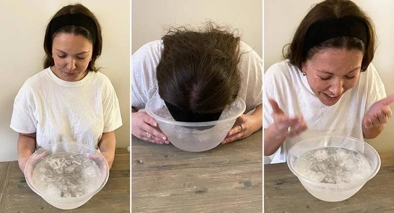 Person nedsænker ansigtet i en balje med iskoldt vand i cirka 15 sekunder