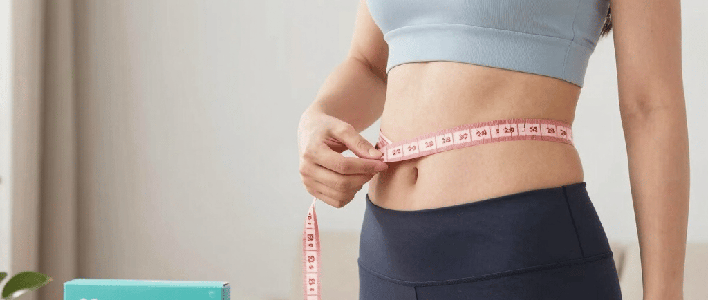person standing on white digital bathroom scale