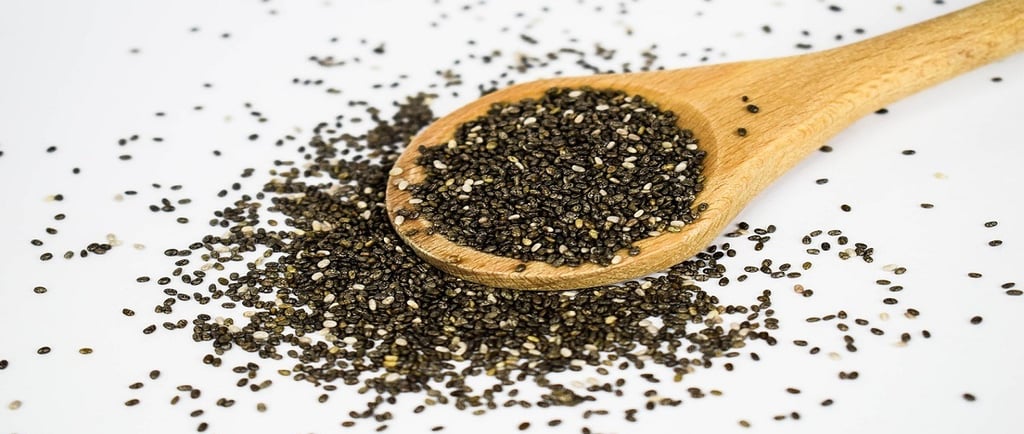 Chia seeds in a wooden spatula