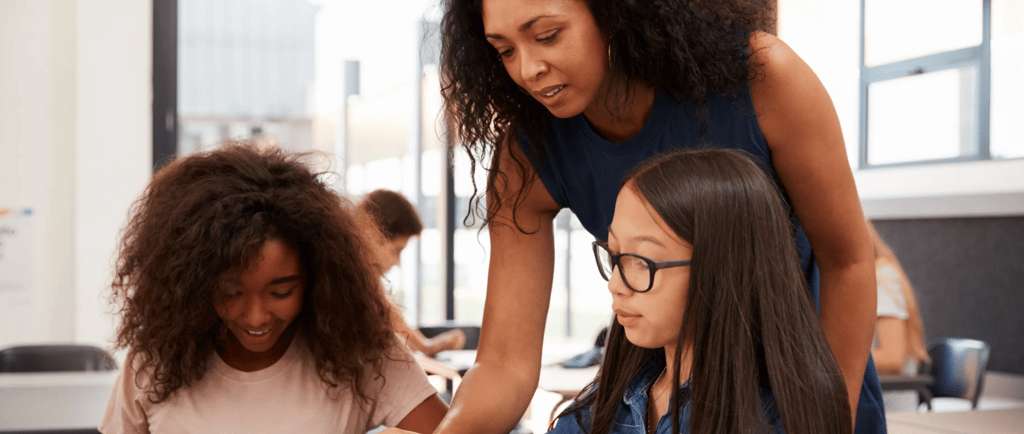 A woman teaching teens