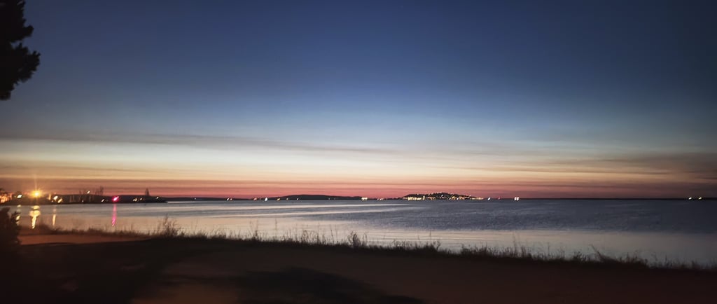 Sunrise over the Etang du Thau with Sete on the horizon