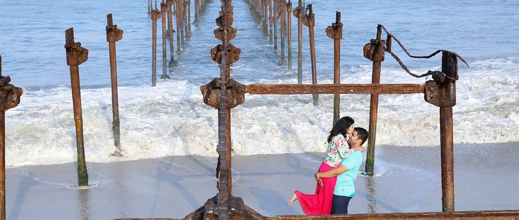 Couple kissing on the beach