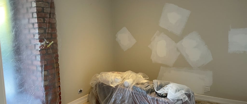 Interior repaint surface preparation in Coorparoo showing patched walls before painting by PJCPainte