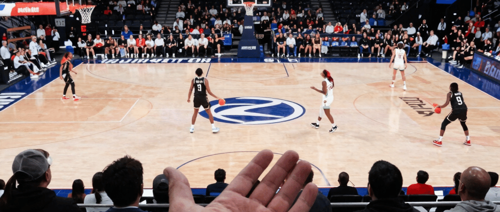 A dynamic action shot of a soccer player mid-kick under stadium lights.