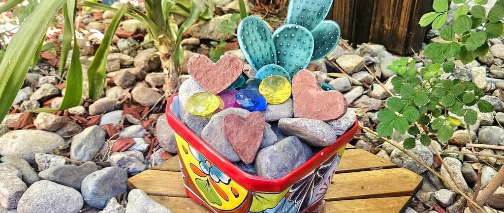Heart-shaped rocks gifted by "Heart King" Robert Sechrengost at Sedona's Boynton Canyon vortex site