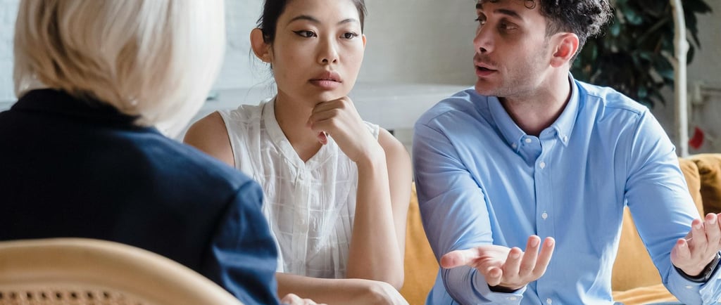 two adults talking to a case manager
