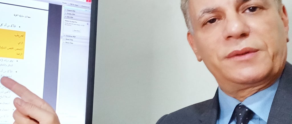 Major General Ayman Saydelahl pointing towards a strategic technical chart