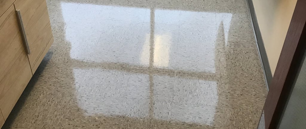 "Floor waxing in Daytona Beach, FL in an office building by TEC Floor Services."