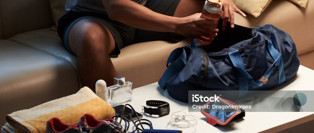 a man packing a gym bag