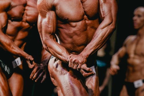 a bodybuilder in competition on stage