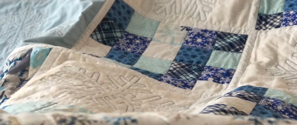 snowflake lap quilt