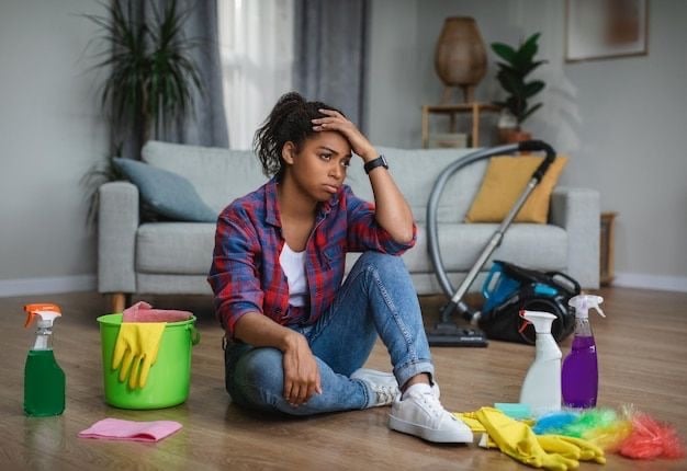 Woman frustrated sitting on the LVP flooring not knowing how to clean it