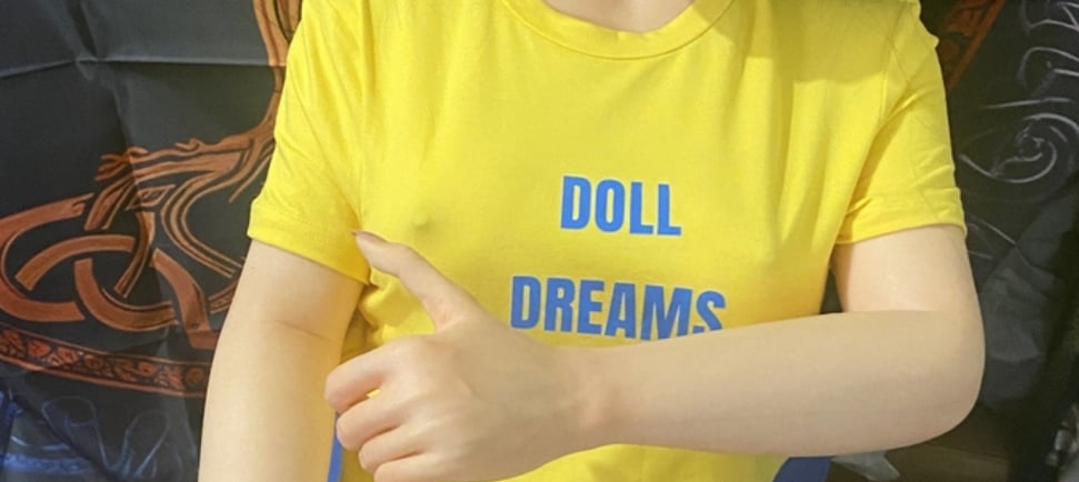 Irontech Doll posed in a yellow tee shirt