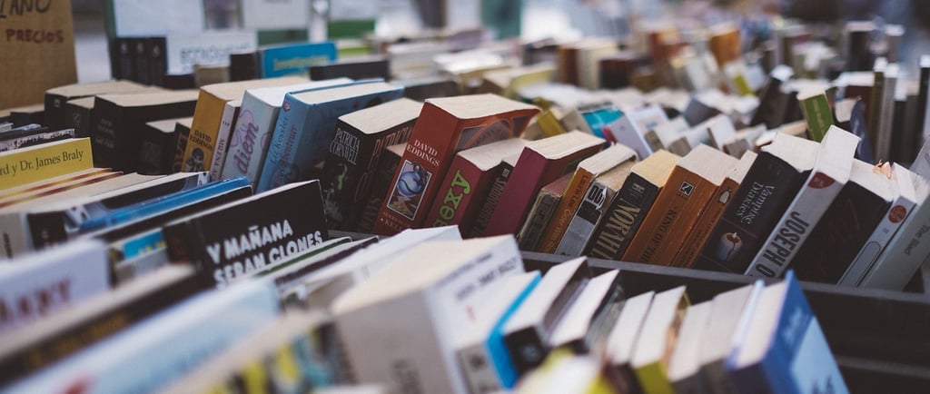 a table with many books on it