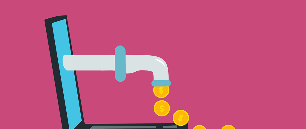 a laptop computer with coins coming out of it