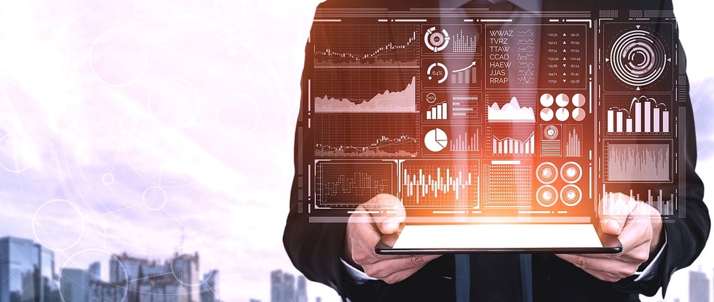 a man in a suit and tie is holding a tablet computer