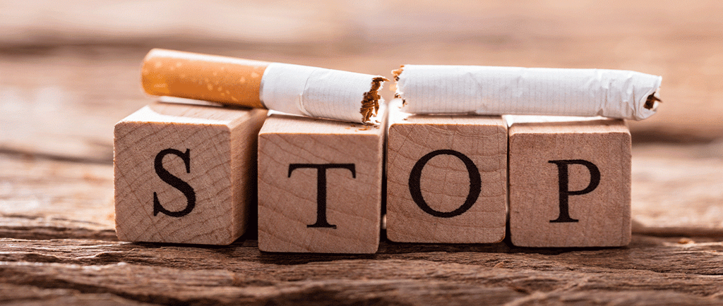 photo d'une cigarette cassée avec le mot STOP