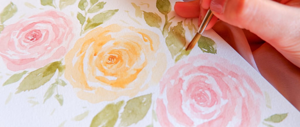 Live watercolor floral painting of roses for NYC event by Handwritten by Belle.