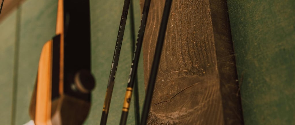 a bow and arrow in a wooden frame