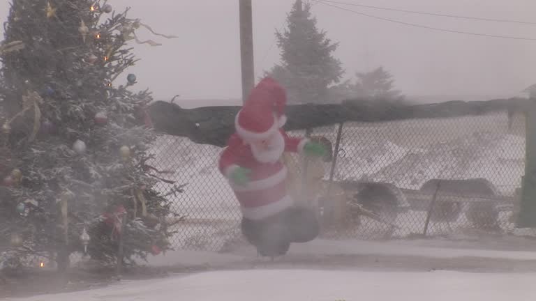 Inflatable Santa in snow storm