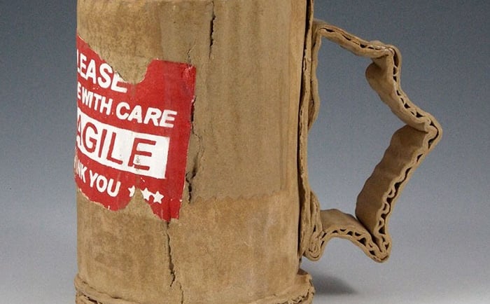 By artist Tim Kowalczyk. Handmade stoneware mug vs mass-produced pottery comparison.