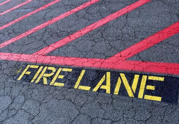 Fire lane red traffic paint
