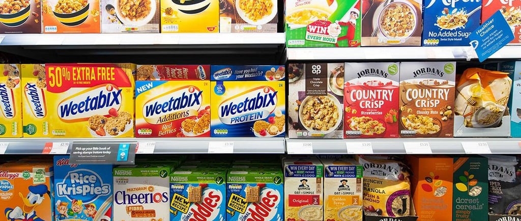 a variety of cereals and cereals on display in a store