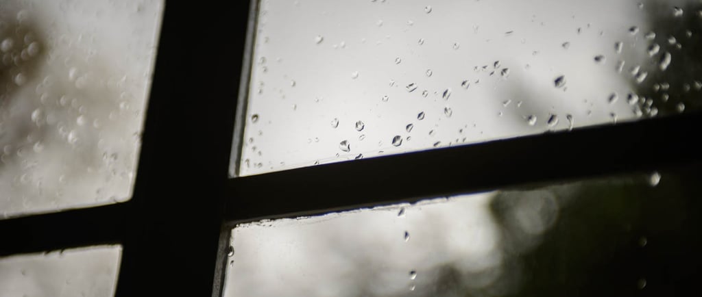 An old window with a droplets of rain. Author: Slawek Dejneka
