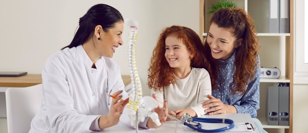 Best Brooklyn chiropractor explaining care to patients