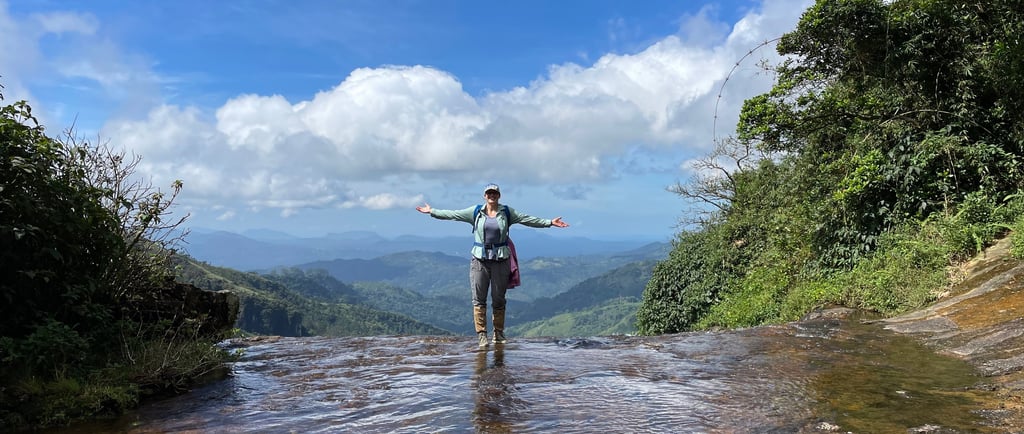 a woman standing in a stream of water
