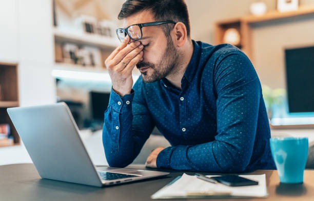 frustrated man with low testosterone at computer