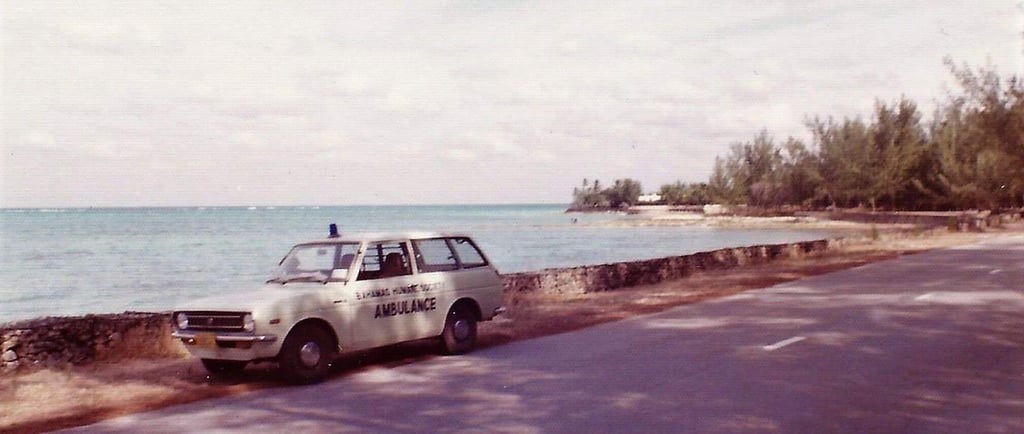 Bahamas Humane society ambulance parked at beautiful beach.