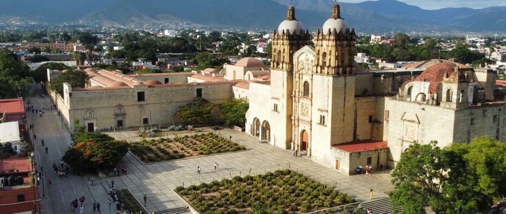 a large building with a clock tower in the middle of it