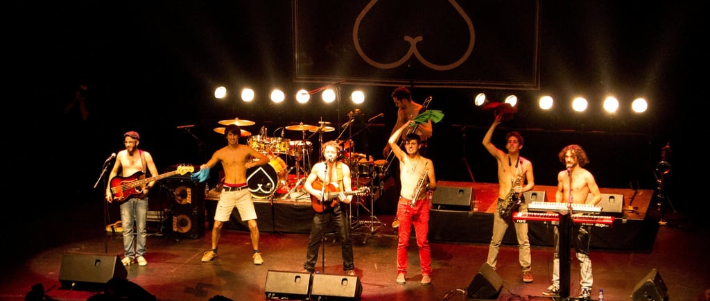 a group of people standing on a stage