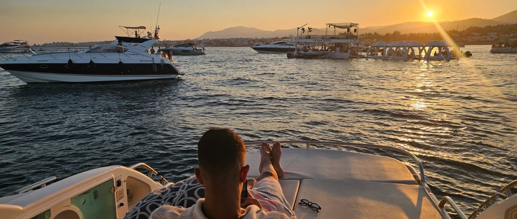 Man enjoy the sunset at yacht in marbella