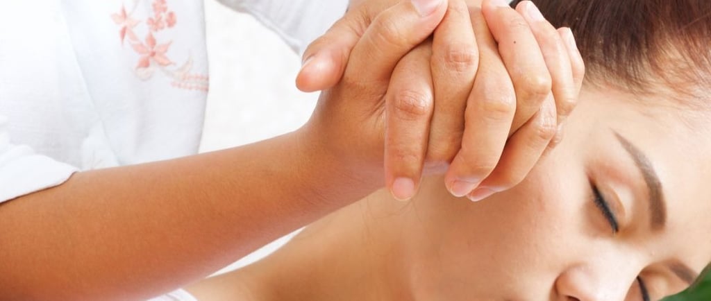 a woman getting a massage at a spa