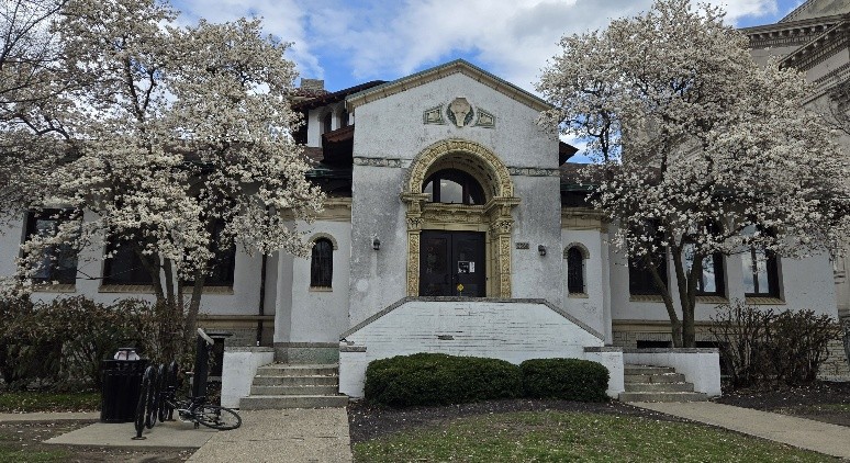 Library with blooming trees in front