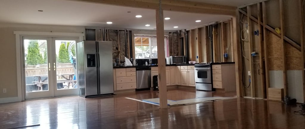 Home damage and home restoration after water damage. Water damage hardwood floors. Cabinets restore.