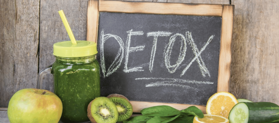 a chalkboard sign with a chalkboard saying detoxox